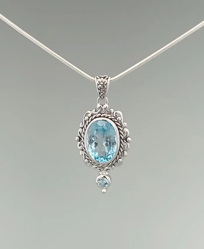 Buddha Groove Sterling Silver Blue Topaz Pendant Necklaces